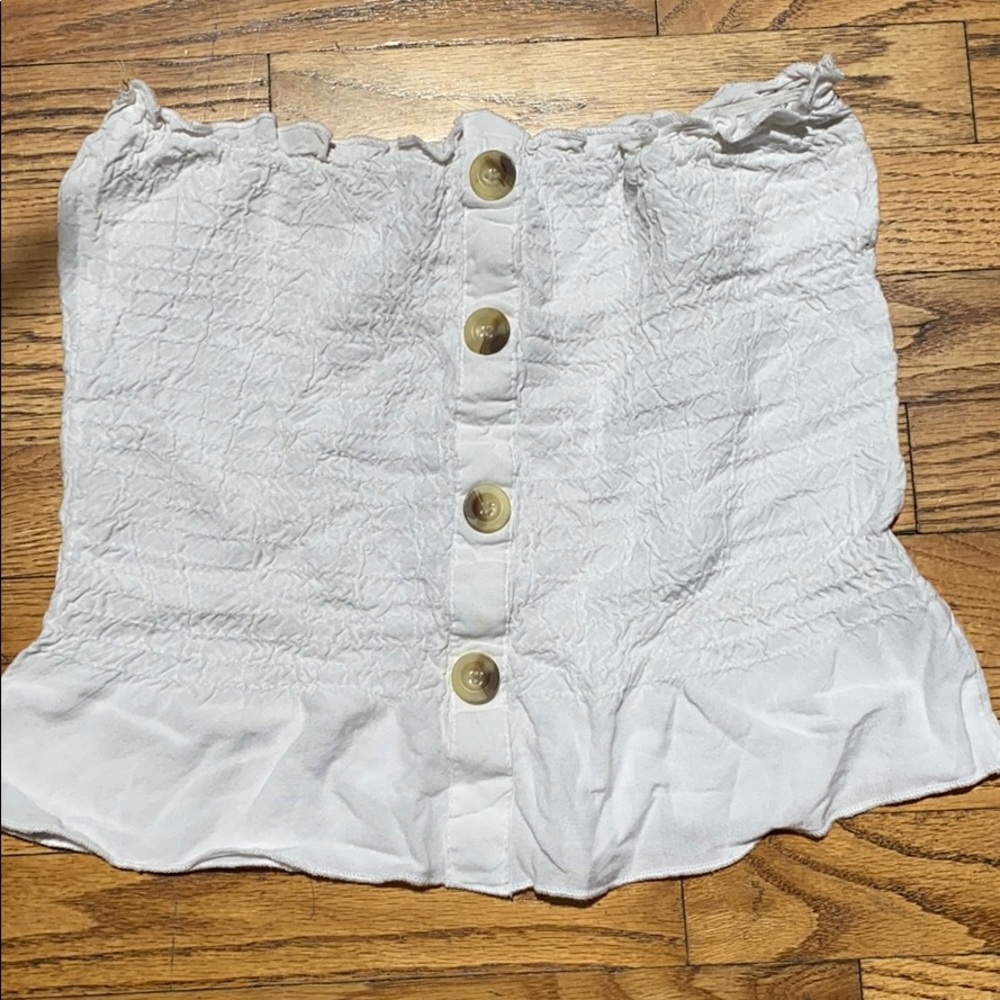 has buttons and is flowy, worn once!!!!